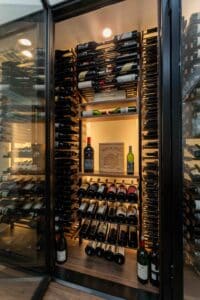 A centerpiece of attraction adds to the aesthetic look of the glass wine closet