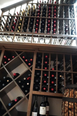 4 - Space-Saving Wooden Wine Racks Display for a Custom Wine Cellar Space-Saving Wooden Wine Racks Display