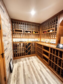 41 - Knotty Alderwood wine racks photo of home wine cellar in traditional alderwood