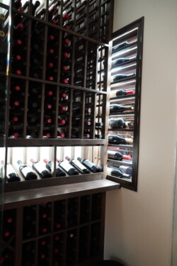 8 - Wooden Wine Racks with a Glass Door for a Custom Wine Room Wooden Wine Racks for a Custom Wine Room