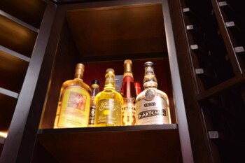 6 - Wine Bottles Displayed in Wooden Wine Racks Wine Bottles Displayed in Wooden Wine Racks