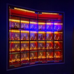LED lights to give a more dramatic ambiance to this restaurant wine cellar design.