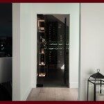 Tinting frameless glass wine cellar doors can provide additional security to your modern wine cellar.