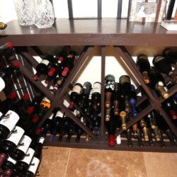 (7) Stained alderwood is a great option for small wine closet designs that need some natural textures.