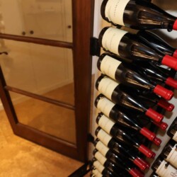 (10) This wooden-framed glass door is also equipped with a automatic bottom lock and Q-lon seal to ensure cold air is kept inside the cellar.