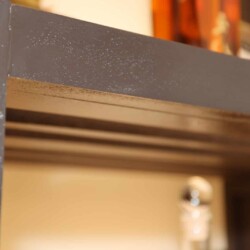 (9) The wooden shelves were all finished with an espresso stain and lacquer.