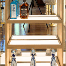 (4) White acrylic panels serve as our shelves, a great upgrade from the traditional wooden shelves.